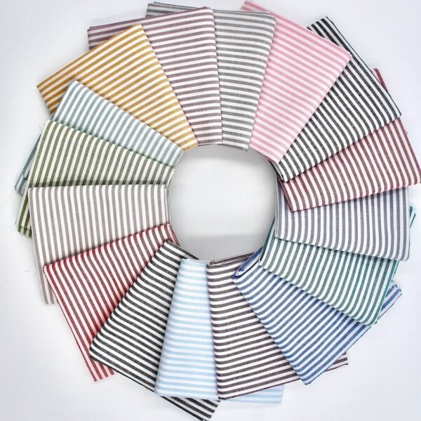 16 x folded 2mm stripe cotton fabric displayed in a circle in lots of colours