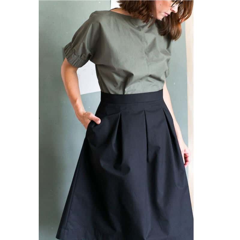 Fashion Model Wearing Assembly Line Sewing Pattern for Three Pleat Skirt  | Advanced  XS - L