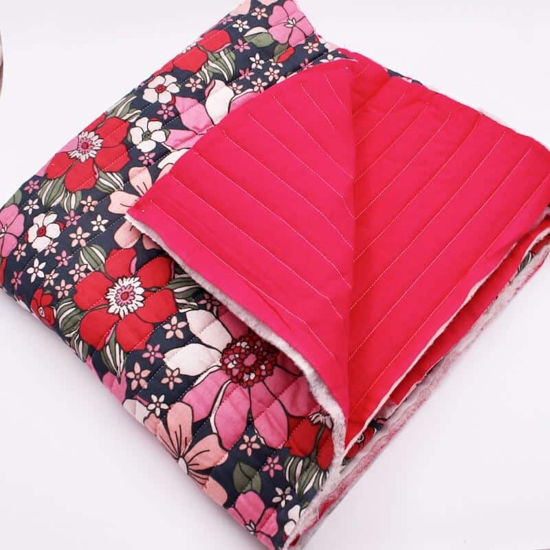 Pre Quilted Double Sided Reversible Cotton Fabric in Sunflower Pink and Plain Cerise B5 1