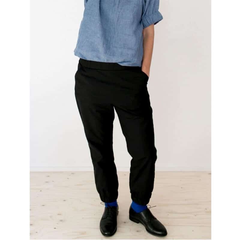 Fashion Model Wearing Assembly Line Sewing Pattern for Almost Long Trousers | Intermediate XS - L